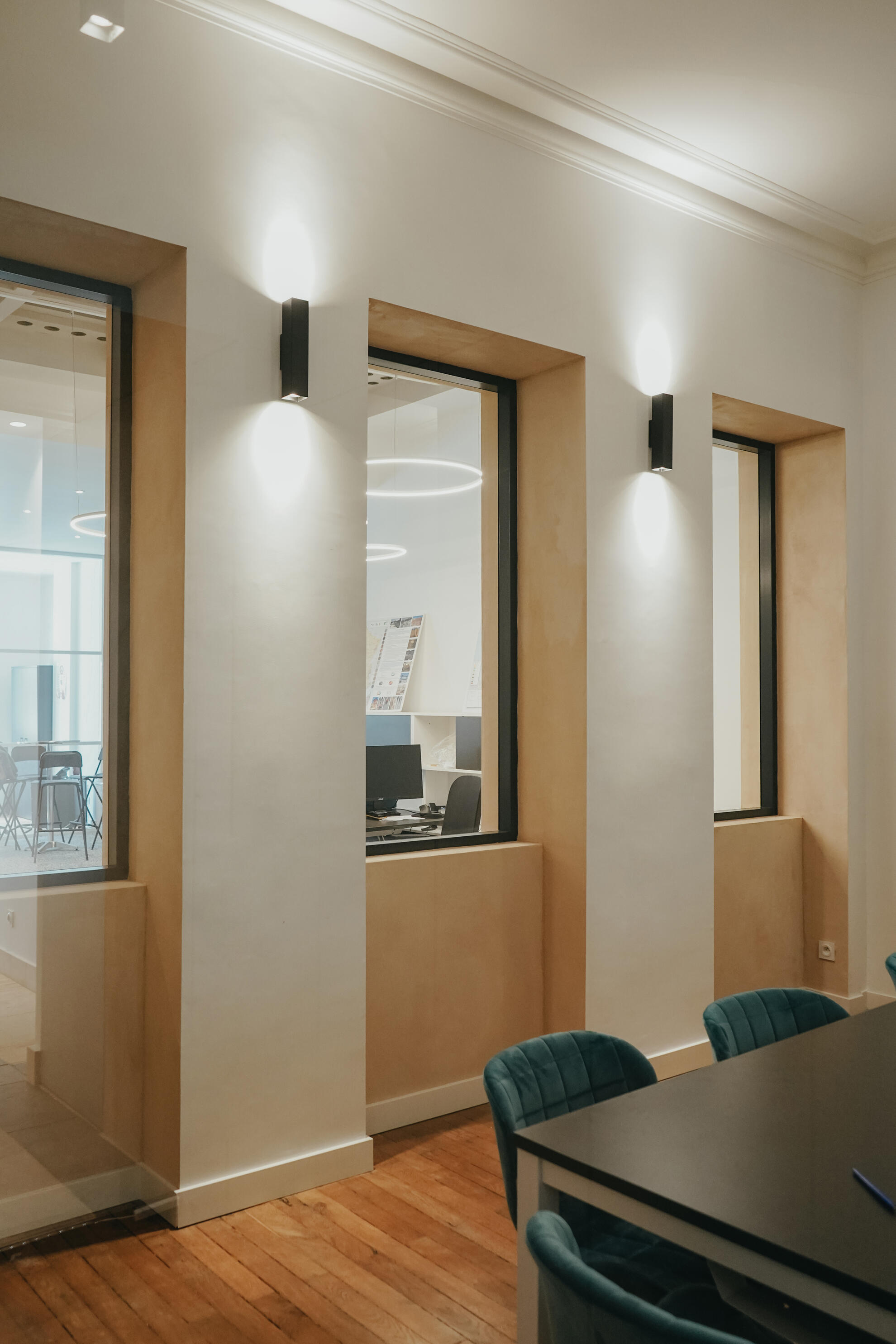 Modern office interior combining natural materials, light and minimalist architectural design.